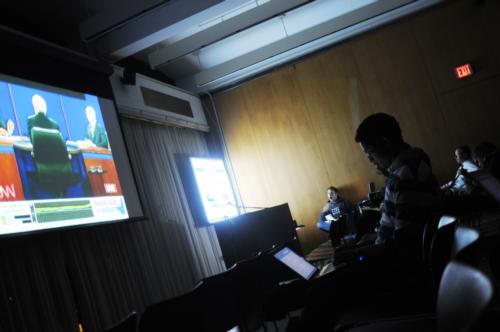 Students watch the final Presidential Debate between Senators Barack Obama and John McCain at the Student Organization Center at Hilles yesterday.