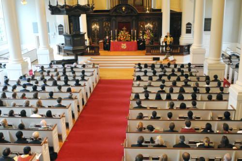 A congregation of mourners gather inside Memorial Church yesterday for a memorial service for Peter W. Cai ’10, who died from sudden cardiac arrest on Saturday.