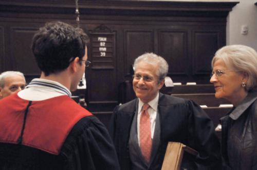 Law school professor and Barack Obama supporter Laurence H. Tribe speaks with Rev. Dorothy A. Austin (right) and a student after speaking during morning prayers at Memorial Church.