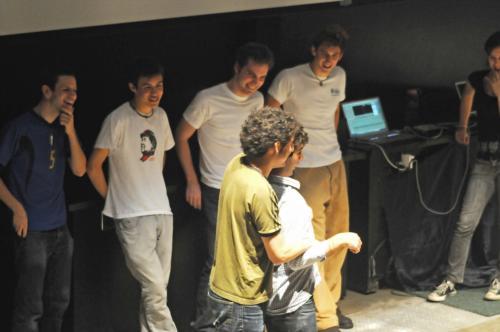Undergraduate members of the “On Harvard Time” improvisation comedy group perform on Friday evening.