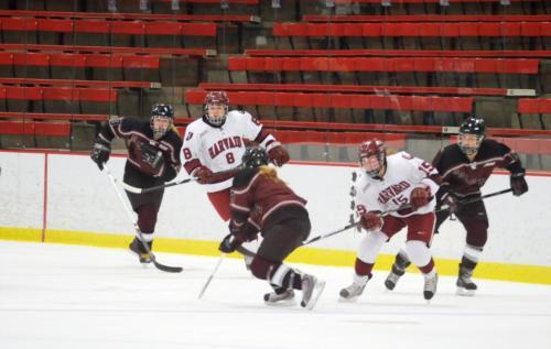 The over-matched Crimson continued to struggle through its thus-far disappointing season, dropping two contests to Minnesota over the break. Junior defender Kathryn Farni (8), shown here in earlier action, scored on a power-play opportunity in the second 