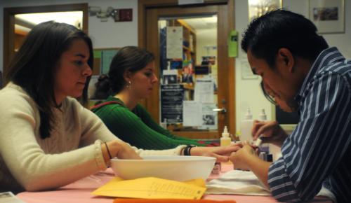 Students gather at Harvard Hillel to treat themselves to a manicure where the proceeds went to the Susan G. Komen Foundation, an organization dedicated to cancer research.