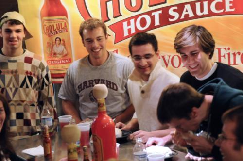 Harvard students compete in the Qdoba Mexican Grill Rice and Bean Pot Burrito Eating Contest last night. 