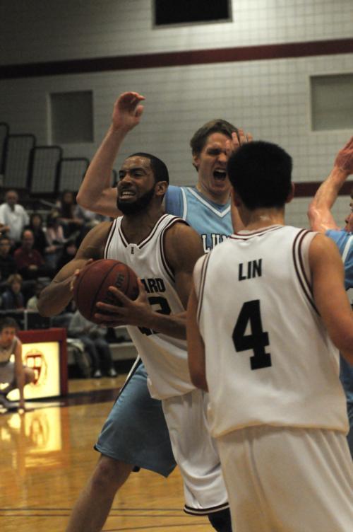 Senior forward Evan Harris led an aggressive defensive effort from the Crimson frontcourt with two emphatic first-half blocks.