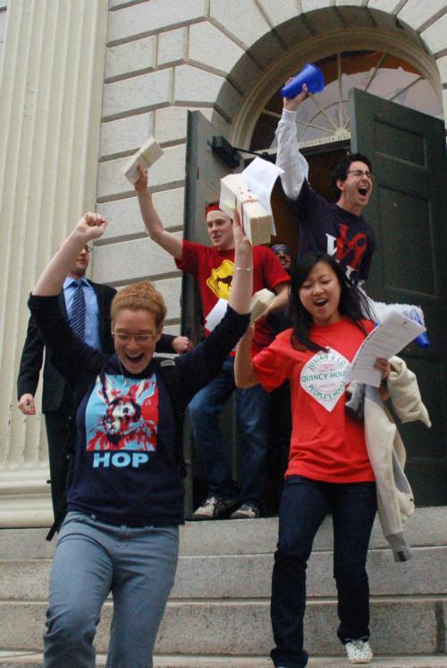 Excited upperclassmen rush out of University Hall to deliver housing letters.