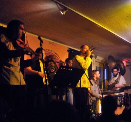 The Fishtank Ensemble, a band which draws from Ethiopian, Balkan, and Gypsy styles, stirred up a whirlwind performance to a packed crowd at Club Passim on Thursday night.