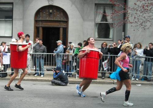 Runners wearing plastic cylinders over their bodies were among the over 20,000 competitors in the annual 26.2 mile
Boston Marathon, which took place yesterday morning.