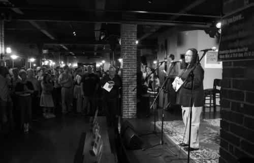 Dean Evelynn Hammonds introduces the live auction for PBHA’s Summer Urban Program.  The auction, which featured items such as vacation packages and memorabilia, occurred along with a silent auction in the Cambridge Queen’s Head Pub last night.