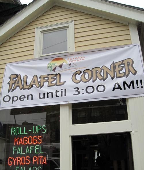 A banner outside the Eliot Street eatery advertises the restaurant's late hours.