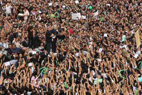 In a photo provided by the campaign of Iranian reform candidate Mir Hossein Mousavi, the opposition leader addresses supporters at a demonstration in Tehran on Thursday. Government bans have hampered efforts by foreign media outlets to photograph protests