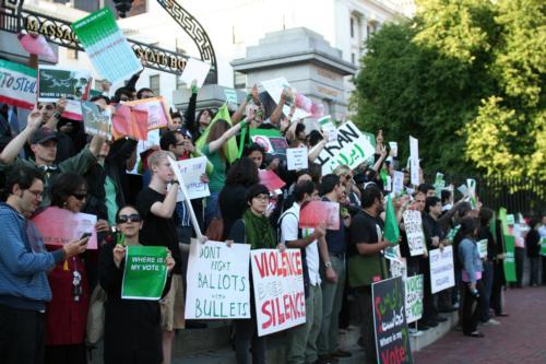 Protesters gather in Boston last weekend to show solidarity with the Iranian opposition at a rally organized by an Iranian graduate student at Harvard.