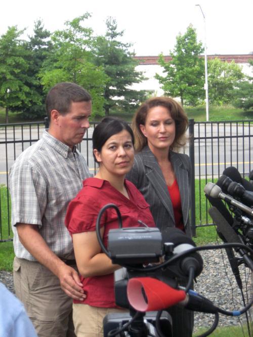 Lucia Whalen, the woman who called 911 and sparked the national controversy over the arrest of Henry Louis Gates, Jr., addresses reporters at a Cambridge press conference on Wednesday. Whalen, accompanied by her husband Paul and lawyer Wendy Murphy, said 
