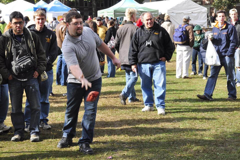 Regatta watchers participated in interactive activities set up by vendors, such as a bean bag toss set up by Chipotle Mexican Grill.
