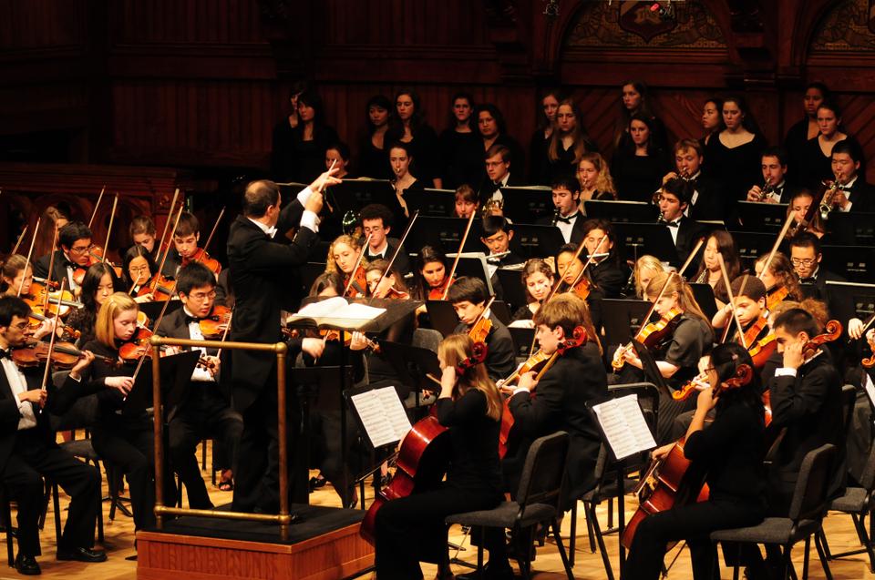 Federico Cortese leads the Harvard-Radcliffe Orchestra through Berlioz's Roman Carnival, Debussy's Norturnes, and Tchaikovsky's Symphony No. 5 in the first show of the Orchestra's 202nd season on Saturday in Sanders Theatre.