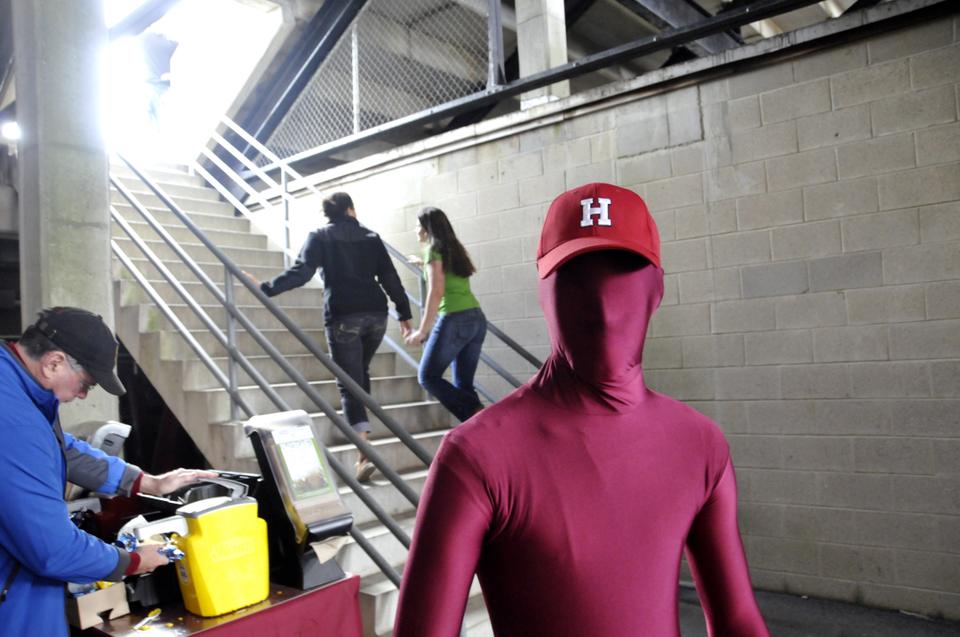 The Crimson man makes an appearance at halftime during the Harvard Dartmouth football game.