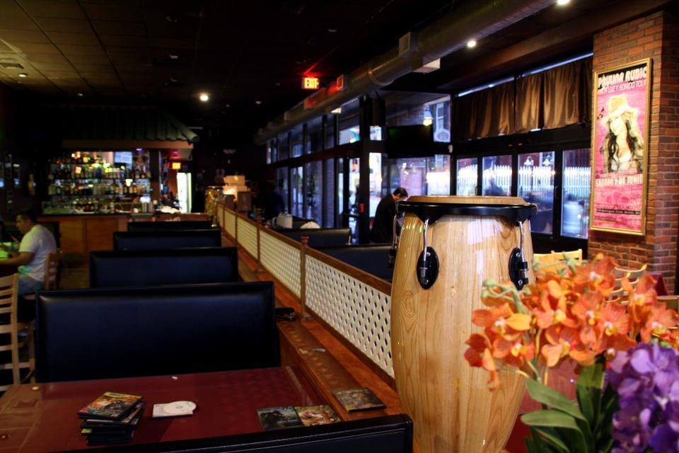 Congas, a new tapas restaurant in Harvard Square, prepares for its grand opening tomorrow. Having recently secured liquor licesnes, Congas bartenders J.D. Acton and Carlos Medina prepare for business later this week. Conga owner Panja Lymswan, also the owner of Spice, recently decided to open Congas, at 1 Eliot street formally Shabu Square.