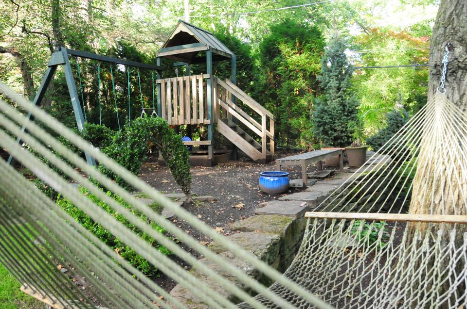 The backyard offers the perfect roaming space for Tobin, the family's dog.
