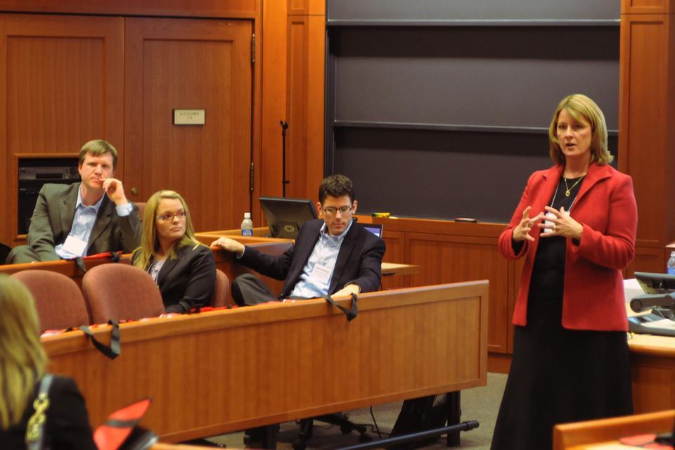 Patty Martin, HBS ‘91, speaks to a room of current students at the Harvard Business School, presenting a company information session on Eli Lilly, a Midwest pharmaceuticals company.