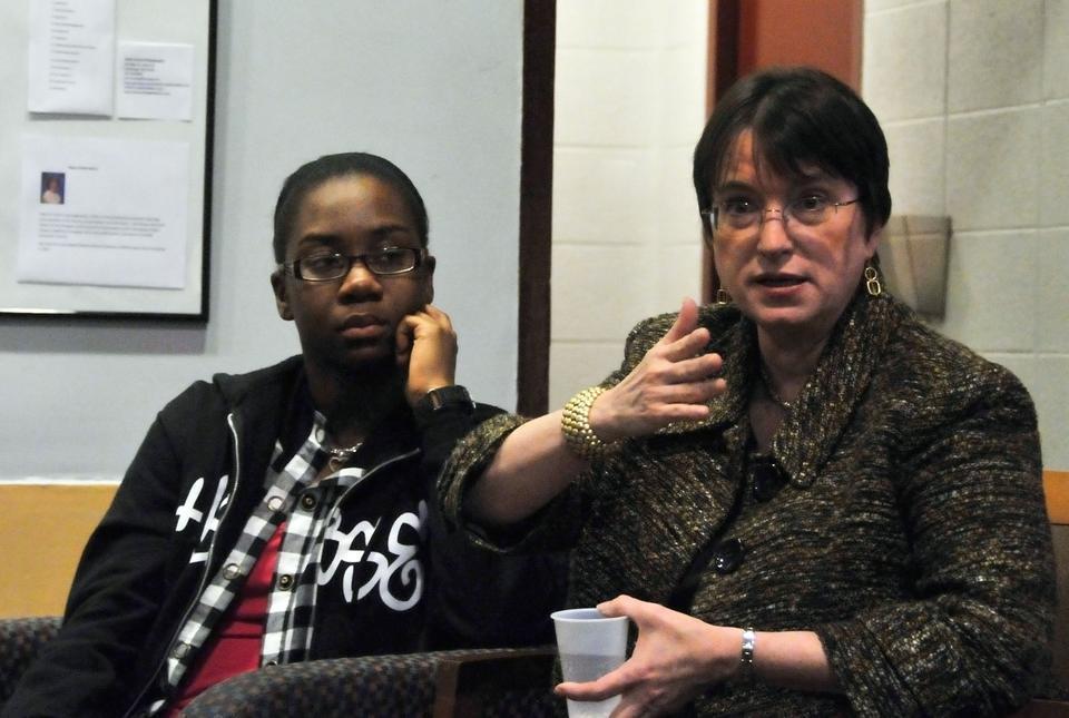 Kim Gandy speaks to Atasha A. Jordan, '13 and others in the Quincy Junior Common room. Gandy is a former president of the National Organization for Women and spoke on a variety of topics including the problem of getting concerted support across a wide range of political issues.