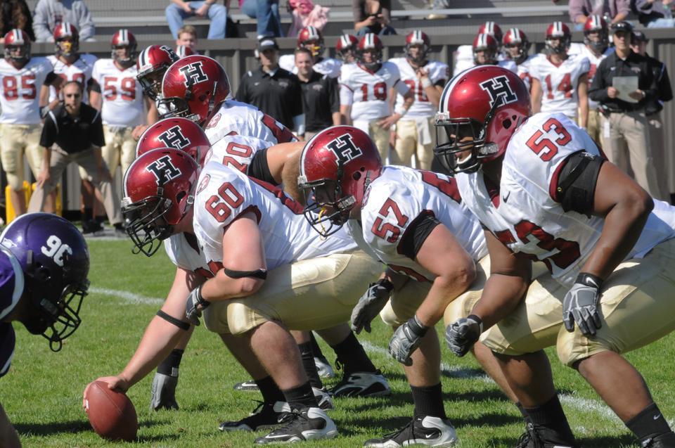 Four seniors have anchored Harvard's offensive line, giving the league-best rushing offense space to run.