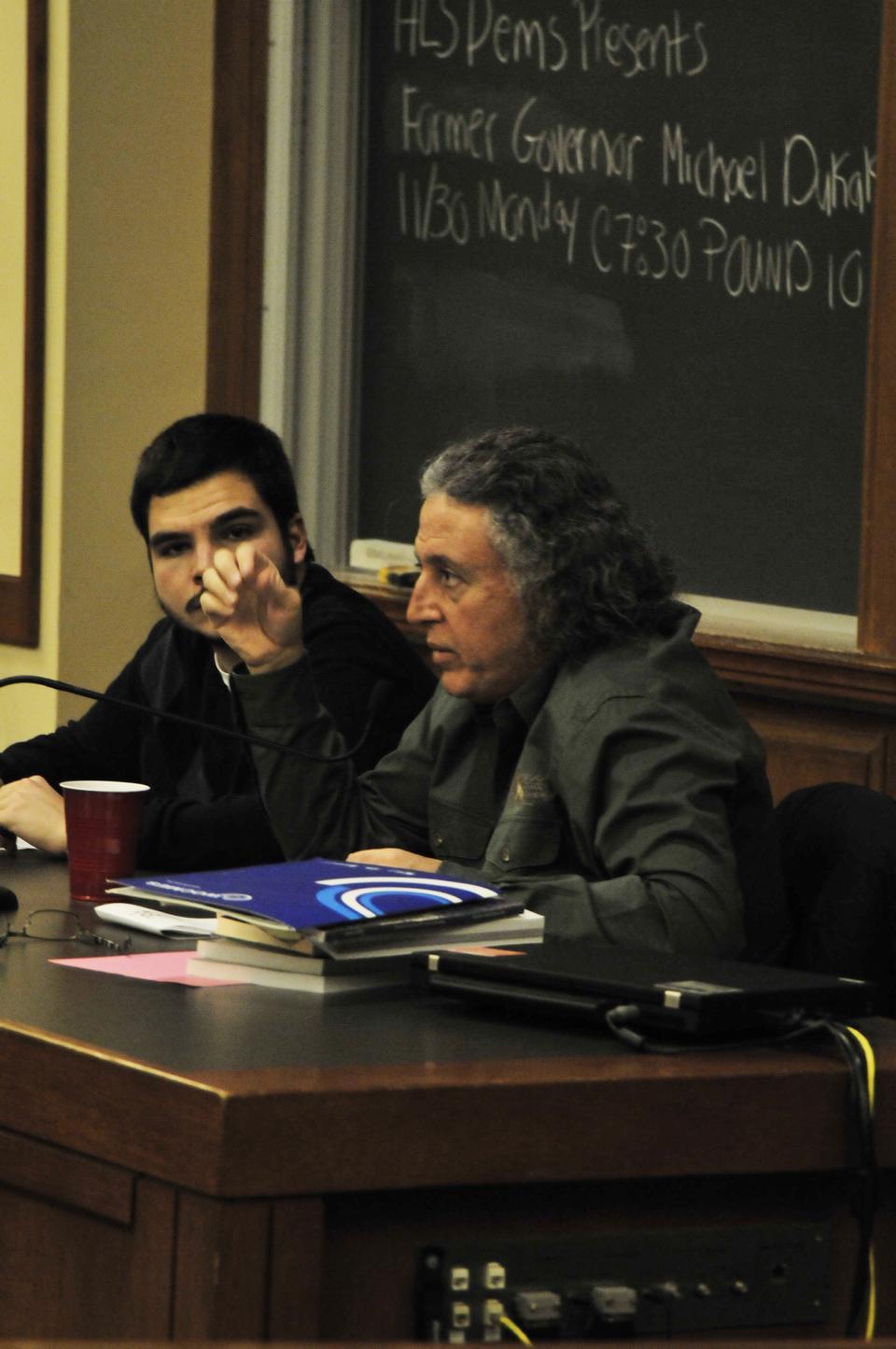 California State Professor As’ad AbuKhalil contrasts the Middle East policies of Presidents Bush and Obama yesterday at Harvard Law School.