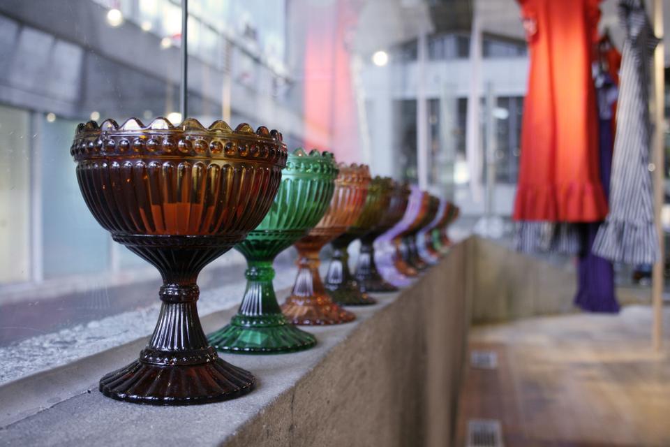 Vintage multi-colored goblets from the Finnish designers line the first floor window ledge.
