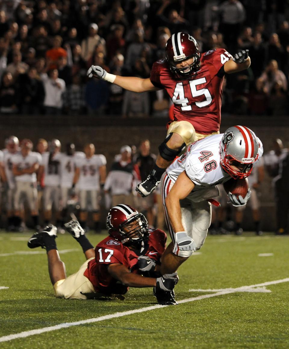 Original Publication Date: November 20, 2009

Senior corner Derrick Barker, shown here making a shoestring tackle, has anchored the Crimson secondary for the last two years. He seeks one final win before chasing his dreams in business and education.