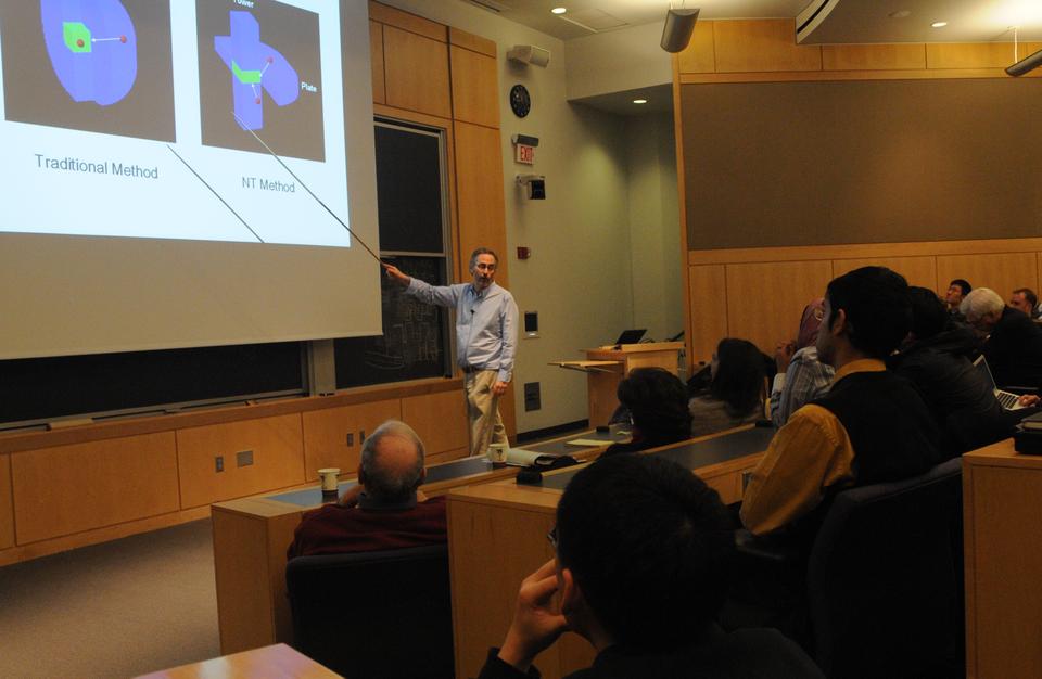 David E Shaw, chief scientist at DE Shaw Research, and the billionaire founder of DE Shaw & Company, demonstrates the cutting edge scientific simulations of the newly built Anton supercomputer, at Maxwell Dworkin Hall on Wednesday.