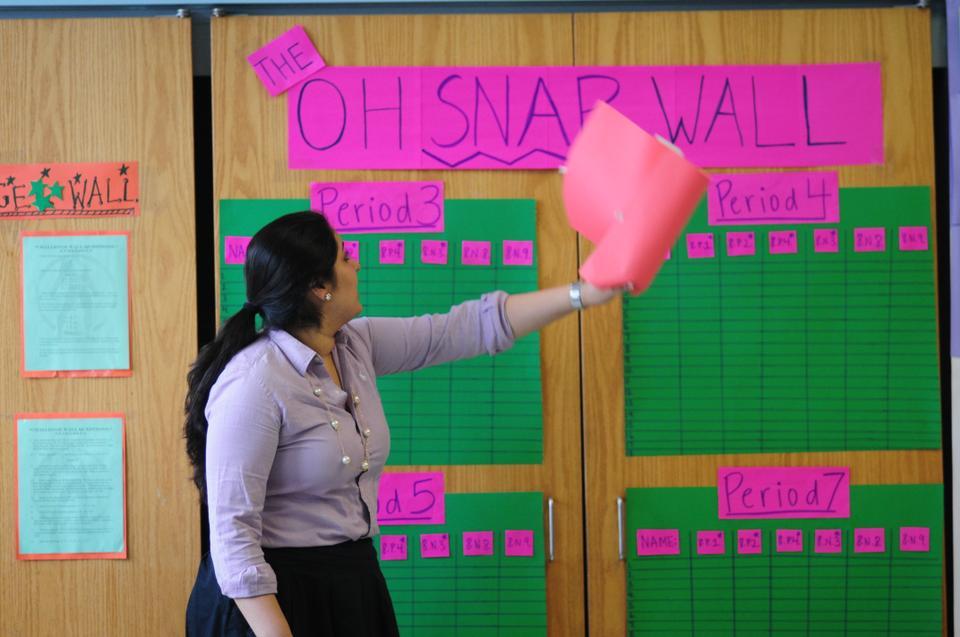 Ms. Dandiya unveils the "Oh Snap Wall," a new initiative to commend exceptional students during the second quarter.