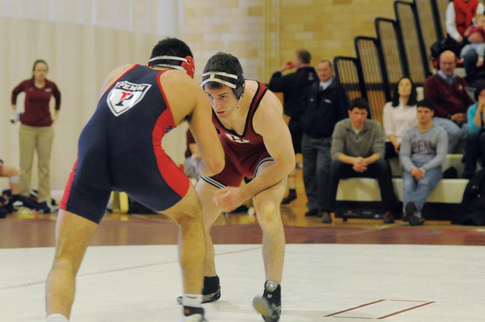 Co-captains Louis Caputo, shown here in earlier action, and J.P. O’Connor will end their wrestling careers as the winningest tandem in program history. 