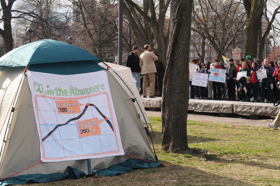 Students and community members pitch tents and gather in Cambridge Common for a sleep-out organized by The Leadership Campaign.