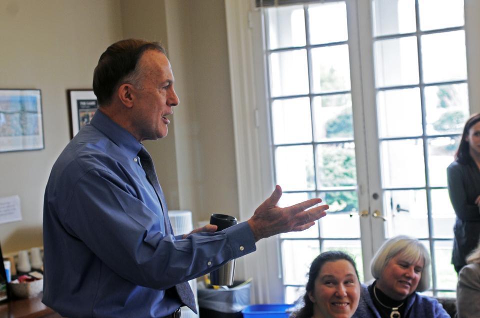 Dean of Admissions and Financial Aid William R. Fitzsimmons ’67 proposes a toast to admissions officers on a job-well-done, encouraging them to be proud of themselves. 