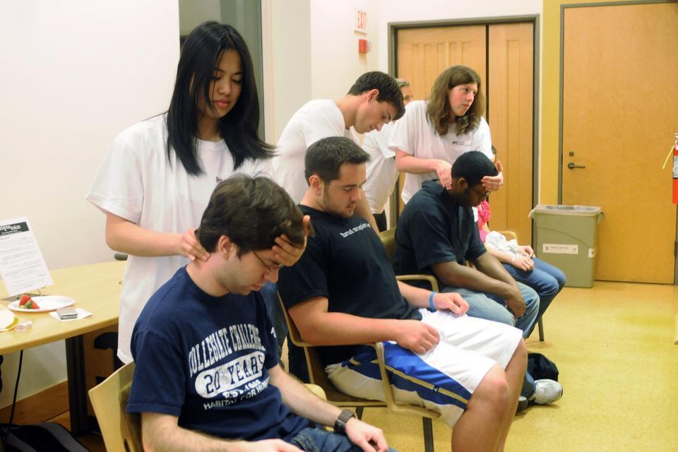 The Harvard Stressbusters give free massages to students at the kickoff event for Sexual Assault Awareness Month held in Ticknor Lounge last night. 