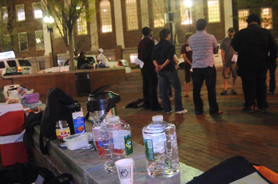 Free food and drinks were given to the homeless Wednesday night as students and Cambridge residents spoke about their experiences with Christianity.