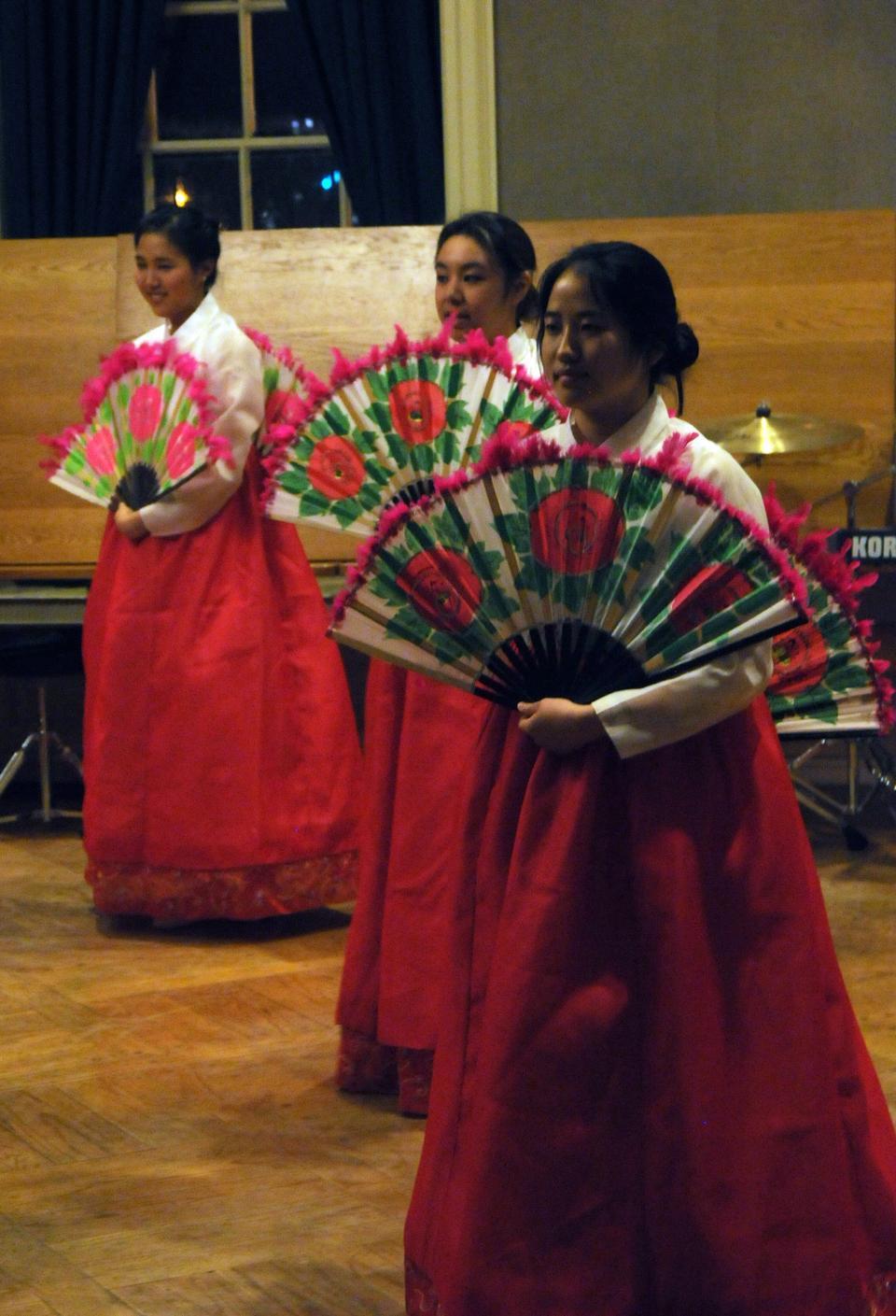 Members of Harvard's Korean Association perform traditional Korean fan dancing at their annual culture show on Saturday night in the Leverett dining hall.