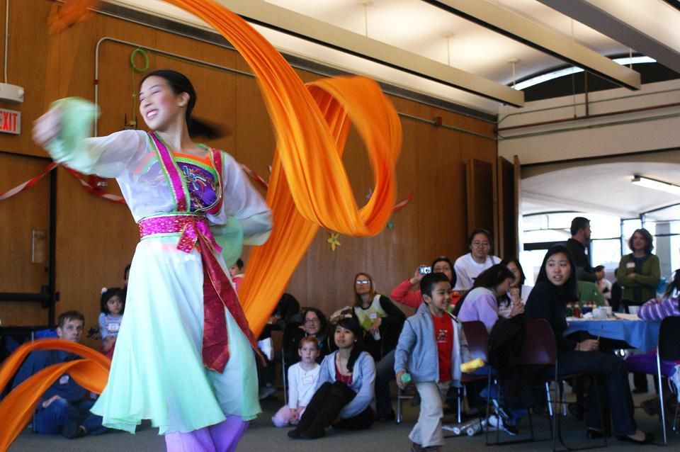 Vivian Lee (a sophomore from MIT) performs a Chinese dance at the Chinacare Carnival to a captivated audience of toddlers and parents. (CORRECTION: An earlier version of the caption for this Apr.  12 photograph incorrectly spelled Vivian Lee's name. The caption has been changed the reflect error.)