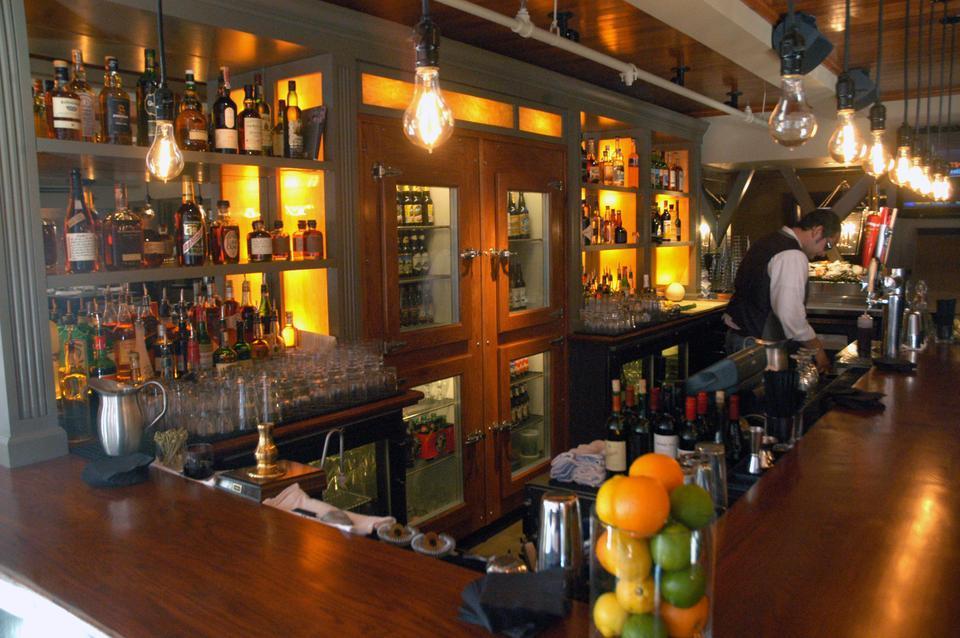 Russell House Tavern on JFK Street replaces Z Square Cafe, which closed last January due to licensing violations amid financial troubles. 