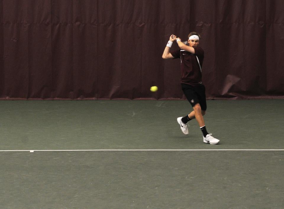 Junior Alexei Chijoff-Evans, shown here in earlier action, won both his singles matches this weekend as the Harvard men’s tennis team recovered from a disappointing start to conference play with a pair of Ivy wins.weekend.