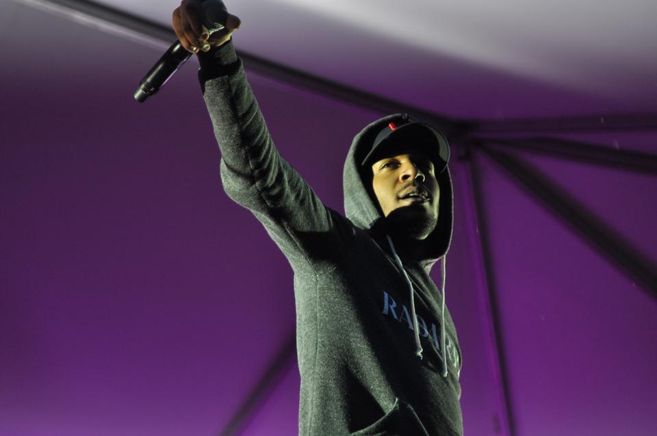 Singer and rapper Kid Cudi performs before a crowd of undergraduates at yesterday's Yardfest 2010.