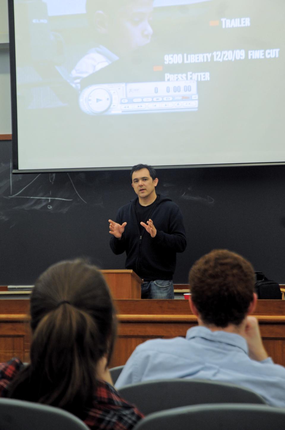 Eric Byler, co-founder of the Coffee Party, which encourages healthy debate about federal government, presents his documentary titled 9,500 Liberty yesterday in Harvard Hall. The event was co-sponsored by the Harvard Democrats and the Asian American Association.