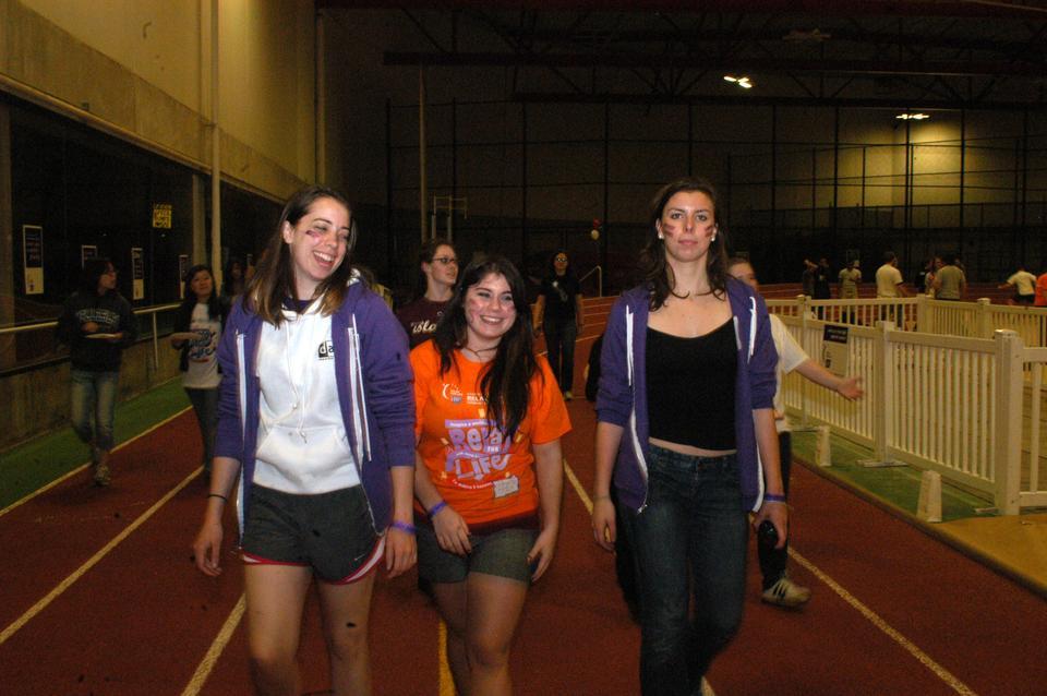 Elizabeth A. T. McLeod ‘11, Elizabeth K. Kinsey, ‘12, and Katie A. Ericksen ‘11 walk during Relay for Life last Friday to support the fight against cancer.