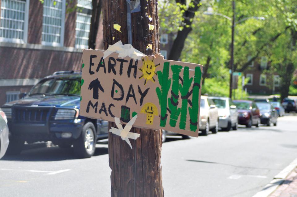 A handmade sign points passersby to the 2010 Earth Day Festival last Saturday, April 24, which featured local foods, live bands, food, and games in the Mac Quad to celebrate the environment and sustainability.
