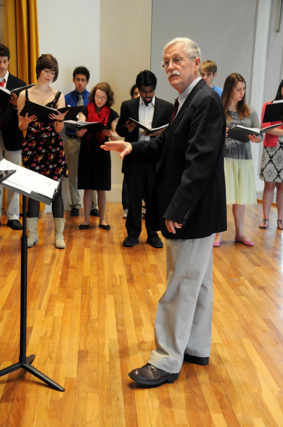 Jameson Marvin, Director of Choral Activities for the Holden Choirs for the past three decades, conducts a rehearsal of Harvard’s co-ed Collegium Musicum with characteristically quirky zeal.