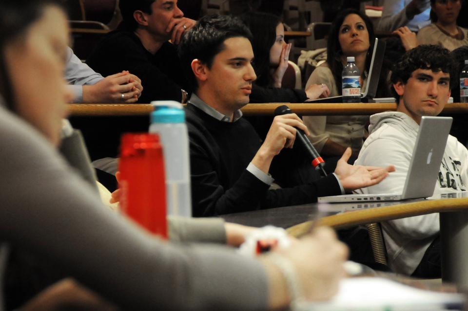 Audience members question panelists about policies regarding homosexual marriage in the twenty-first century. The event, entitled "Is Marriage a Right? A Dialogue on Marriage Policies from California to Massachusetts," featured panelists on both sides of the issue, and was hosted by the LGBT and Latter-Day Saints Students Association caucus.