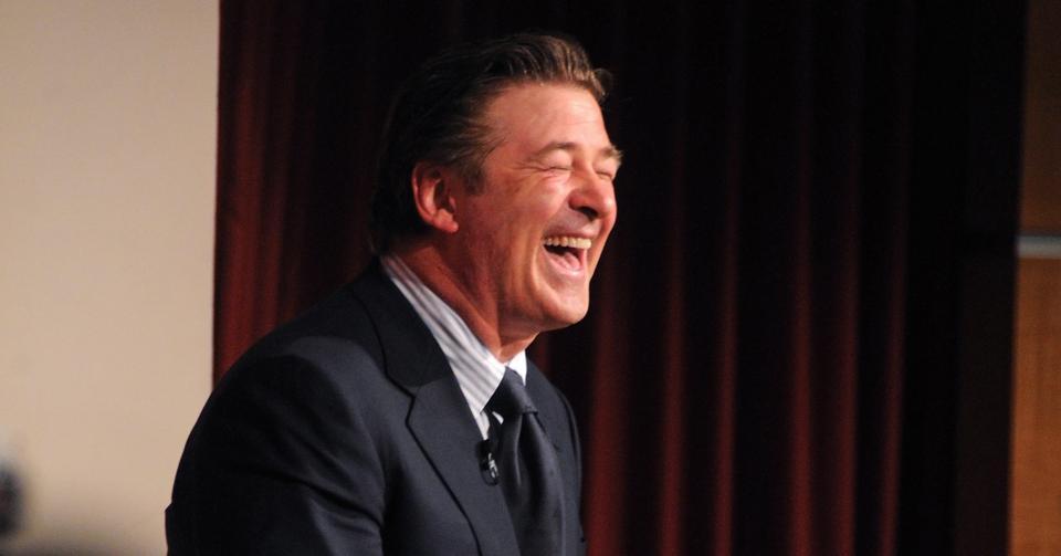 Actor Alec Baldwin laughs after a female audience member compliments him by saying he is very good looking. Baldwin talked about politics, Sarah Palin and Saturday Night Live among other things at the JFK Jr. Forum yesterday. 