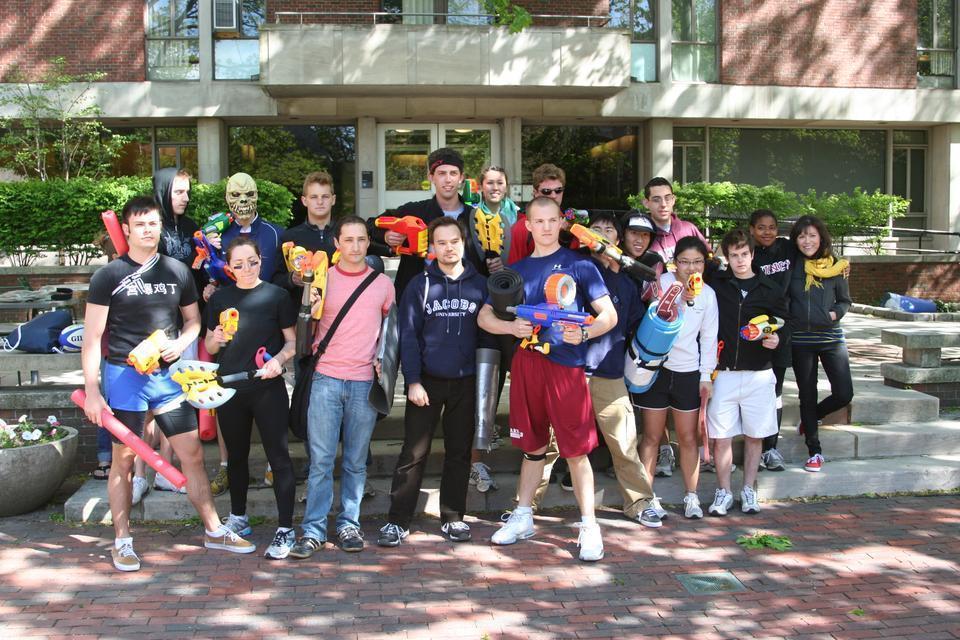 The final few teams in Quincy House Assassins assemble yesterday afternoon in Quincy Courtyard for a battle royale to determine the Assassins winner.
