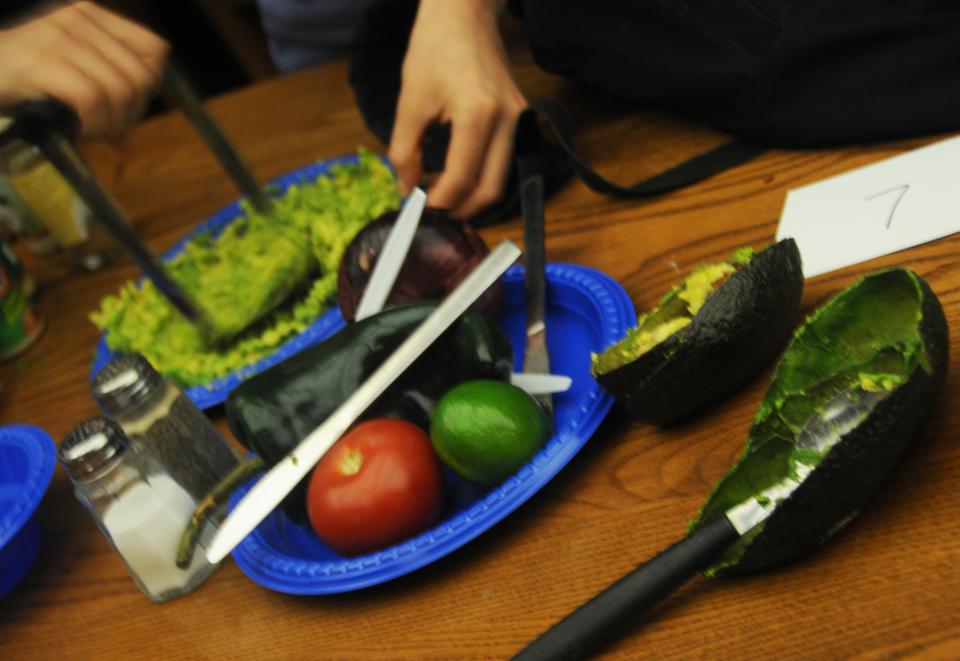Natalie C. Padilla ‘12 makes guacamole at the Harvard Culinary Society’s 2nd Annual GUAC OFF sponsored by Boloco on Wednesday, May 5, 2010.  The event was held in Quincy Dining Hall.