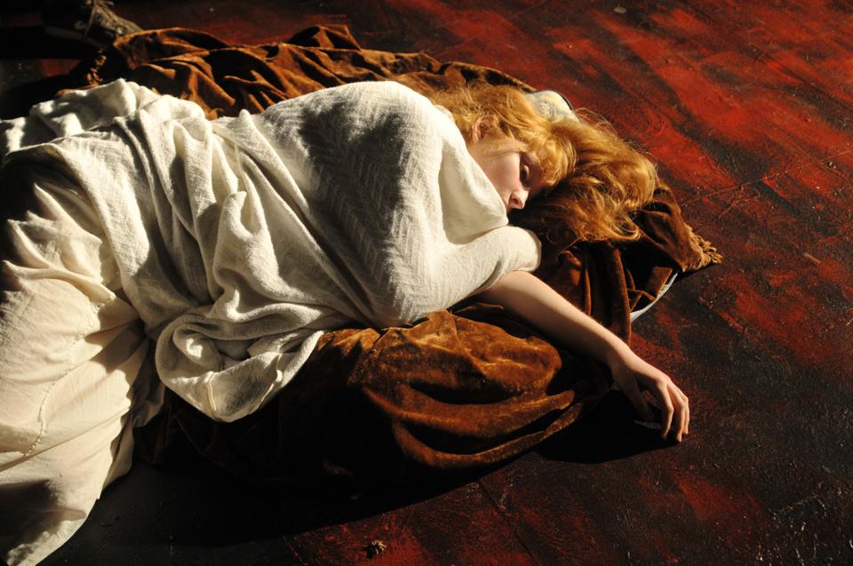 Elyssa Jakim '10 lies on the floor during a performance "Marat/Sade," Peter Weiss's revolutionary radical drama, in the Loeb Ex Theater.