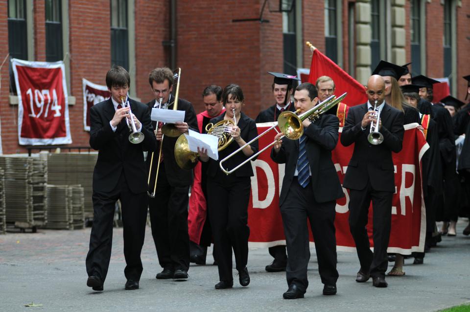 The Autumn River Brass Band leads senior undergraduates from Dunster House into Harvard Yard to take part in Commencement exercises on May 27, 2010.