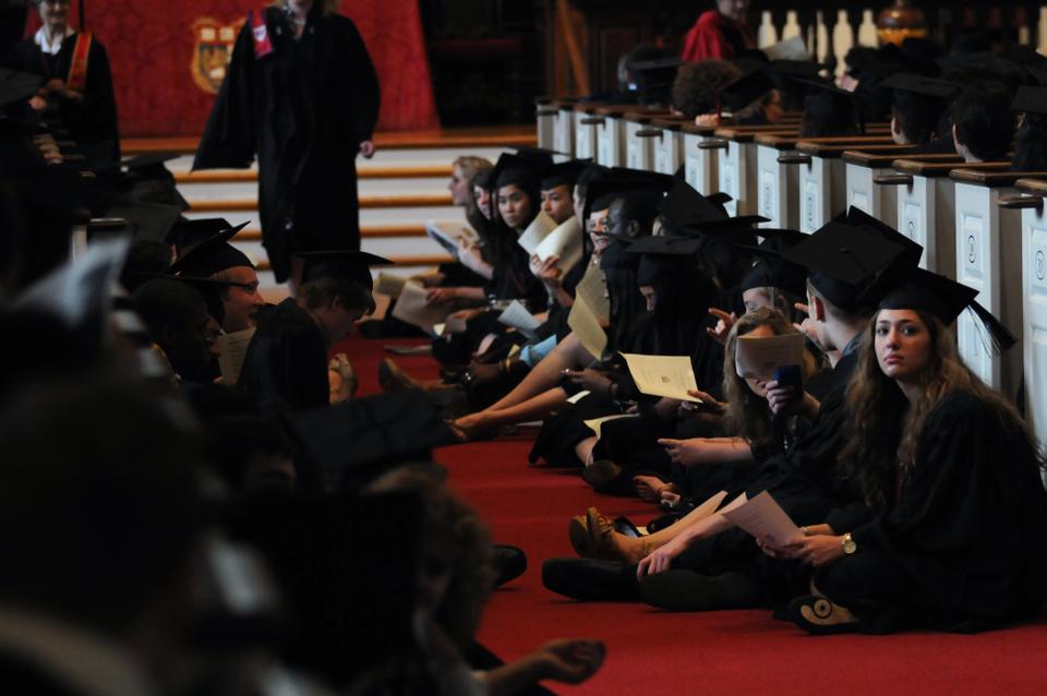 Members of the Harvard College Class of 2010 fill the aisles of The Memorial Church during a service led by Reverend Peter J. Gomes.